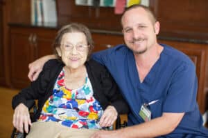 Smiling nurse and resident