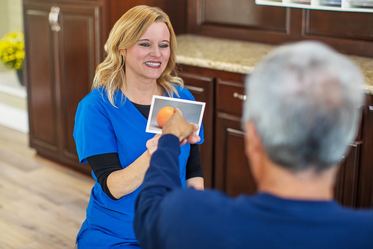 Physical therapist helping patient